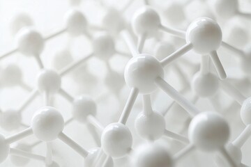 A complex network of white plastic tubes and connectors, arranged in a geometric pattern against a stark white background.