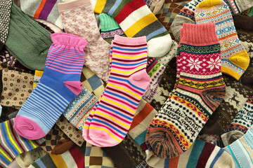 Textured fabric background. Brown, sheer, lightweight fabric creates a soft texture. Layers of silk textile.