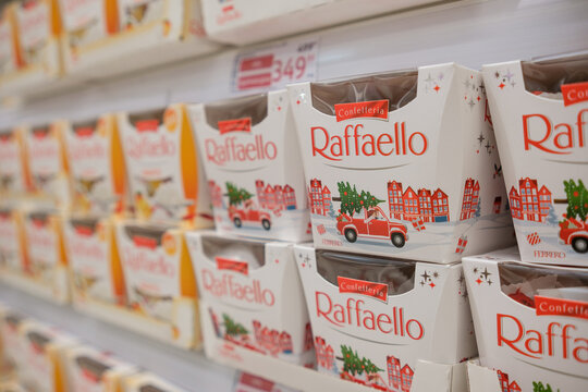 November 30, 2025, Moscow, Russia. Raffaello Confectionery Boxes Neatly Arranged on a Store Shelf in a Grocery Store