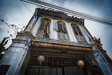 Facade of the old chinese abandoned house in Papan Heritage village in Perak Malaysia