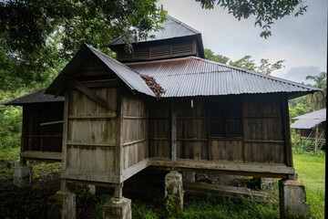Historic Masjid Lama Papan, a traditional wooden mosque in Papan Heritage Village, Perak, Malaysia