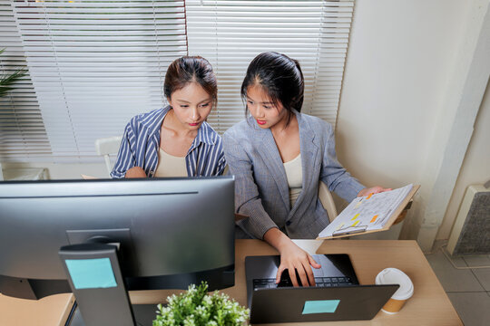 Young business women work from home office, team colleagues online collaborate, people learn new strategies, analyze project charts, typing on laptop, preparing for successful future - Powered by Adobe