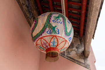 Chinese paper lantern with a dragon painting in the chinese temple in Malaysia