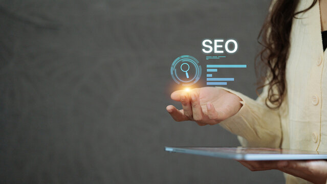 Businesswoman Holding Virtual Search Hologram on Tablet