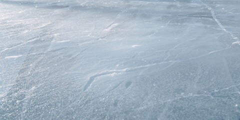 Fototapeta premium Ice rink surface in park, suitable for recreational skating and public events