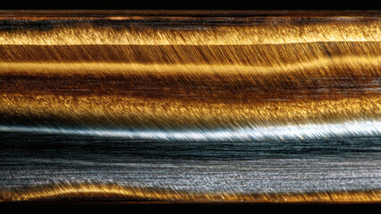 Golden Shimmer Captivating Waves of Yellow and Gray Mineral Texture