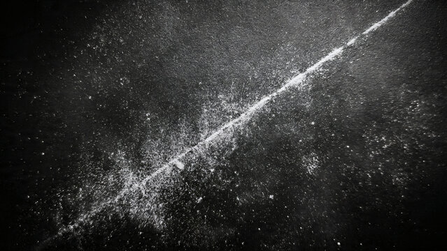 Dramatic diagonal luminescent streak of fine particles cutting across a deeply textured dark canvas, an abstract depiction of impact, energetic division, or a cosmic trail through the unknown