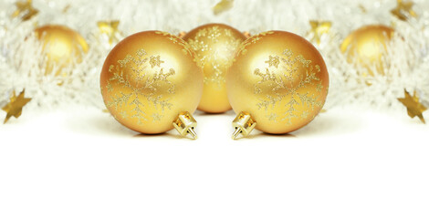 Christmas balls with tinsel on a white background