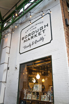 Iconic Borough Market sign on white brick wall. London, UK, 17 December 2023