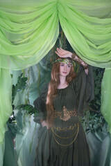 An elven story. A girl with long hair in a magical forest studio