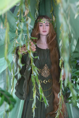 An elven story. A girl with long hair in a magical forest studio