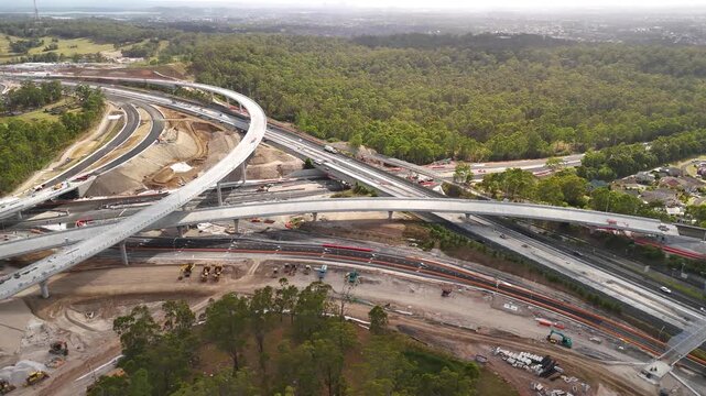 Aerial drone view above the M7-M12 Interchange at Cecil Hills, Western Sydney, NSW Australia on a sunny morning in December 2025