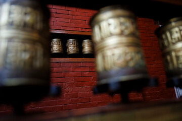 Prayer Wheels and Bell in Buddhist Temple, Nepal