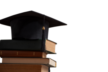 Stacks of books, Square academic cap or graduation hat. Concept of education, knowledge, intelligence