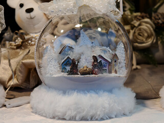 Nativity scene at the interior of christmas ball