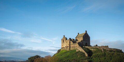 Raw chicken liver on a white cutting board used for meal preparation, emphasizing food safety and hygiene practices