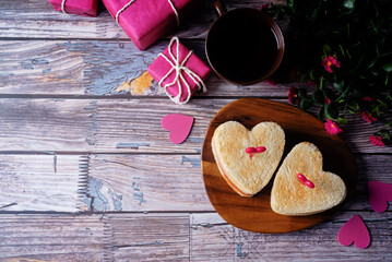 Ham tomato and cheese canape sandwiches in the form of heart for Valentine's day holidays