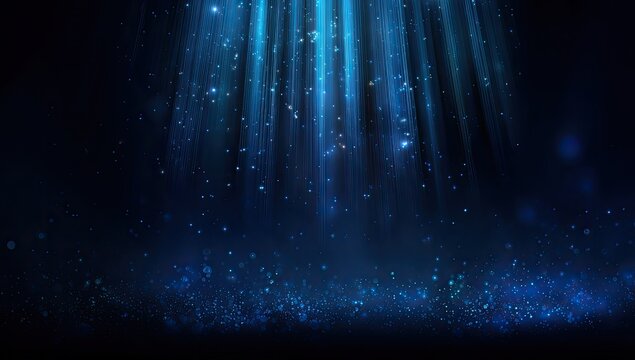 Abstract blue light beams cascade downwards, particles sparkle in the depths