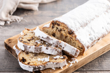 Traditional Christmas Stollen with Raisins and Powdered Sugar on christmas