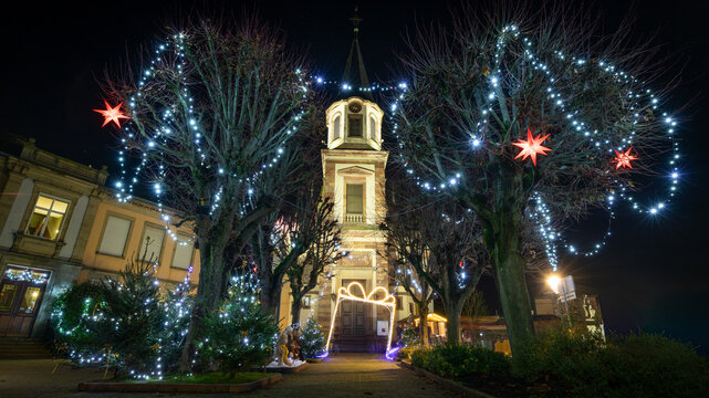 Beautiful decoration and Christmas market at night in Reichstett in France on November 28th 2025