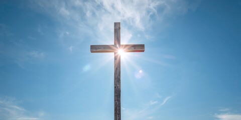 Weathered wooden cross set against a clear blue sky, emphasizing rustic craftsmanship, Earth Day