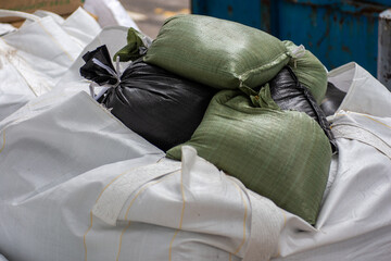 Sandbags in a pile on the street