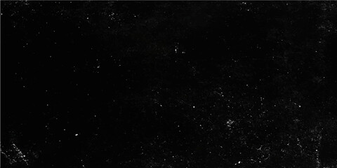 Abstract dark cosmos texture with black ink splash and white dust particles across the night sky © FANUSH