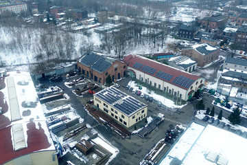 Sustainable energy on industrial rooftops winter scene