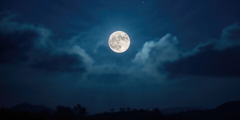 Sunlight filters through winter clouds over alpine mountains, emphasizing seasonal change