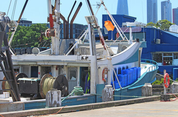 Fishing boat docked in a bay in Sydney