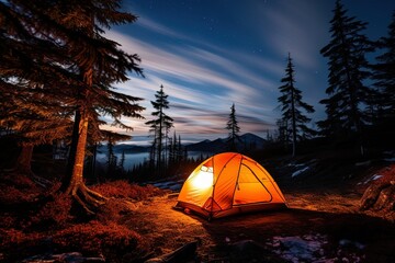 small orange tent is set up in forest at night. tent is lit up with small light inside. scene is peaceful and serene, with trees and sky providing beautiful backdrop