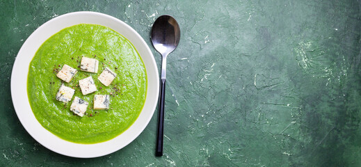 Green broccoli soup with blue cheese. Vegetarian. Healthy eating.