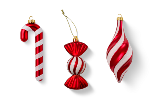 Set of red and white Christmas ornaments isolated on a transparent background, including a candy cane and decorative baubles. Christmas ornaments for holiday decoration and winter decoration design. 