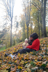 Family Enjoying Autumn in the Forest Copy Space