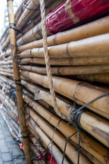 A stack of bamboo sticks in a market