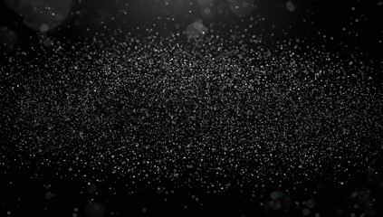 Obraz premium Silver glitter on black background, used as a design element for visual texture and layout enhancement