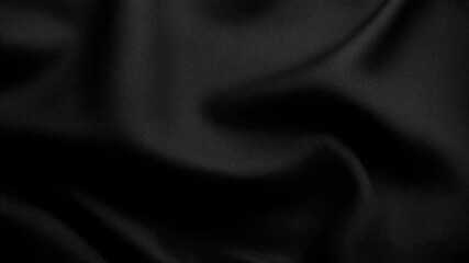 A close-up view of a smooth black fabric displaying elegant texture and shine. - Powered by Adobe