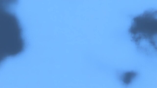 A blurred blue background with cloud-like shapes and an Adobe Stock watermark.