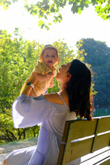 Mother and Child Enjoying a Sunny Day in the Park.