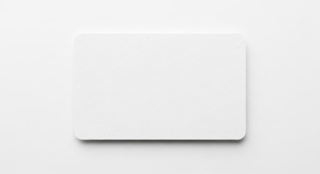 Blank white card with rounded corners on a white surface.