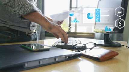 businessman organizing tax checklist through virtual interface. Tax planning services to maximize tax savings and optimize business finances