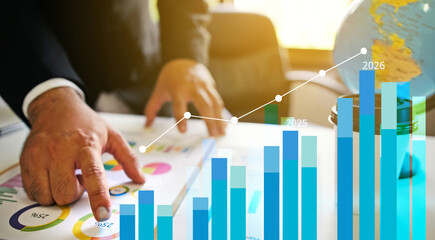 Businessman reviewing balance sheet and virtual data charts. financial analysis concept, strategy planning and growth opportunities, calculating company investment