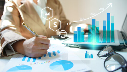 Businesswoman calculating financial data for long term investment growth goals. financial analysis concept, strategy planning and growth opportunities