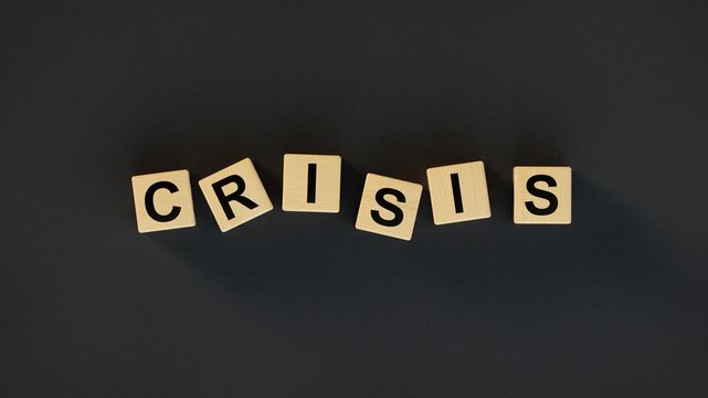 Wooden alphabet blocks arranged to spell Crisis on a dark textured surface. Minimalist business-themed concept of financial downturns and economic challenges. 3D render animation