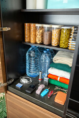72 hour survival kit storage. Full emergency food pantry stocked to survive in disasters or war.
