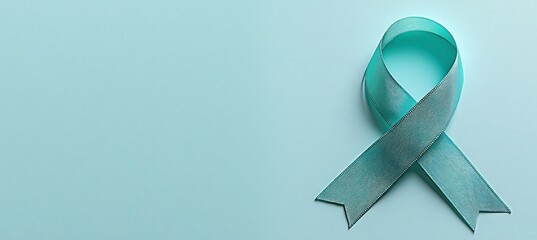 Teal Awareness Ribbon for Health and Social Causes on Blue Background