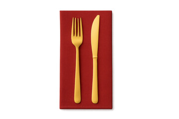 Gold fork and knife on red napkin dining table setting