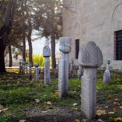 Old Ottoman cemetery beside stone mosque in Tarakli Sakarya