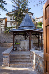 Historic stone fountain pavilion with wooden roof in Tarakli Sakarya