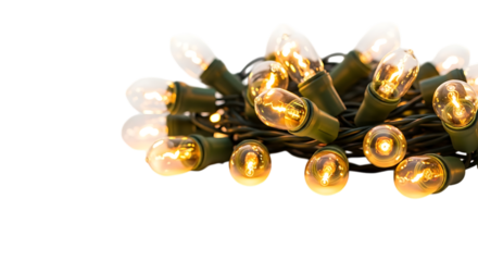 Cluster of warm white christmas lights glowing brightly isolated on transparent background